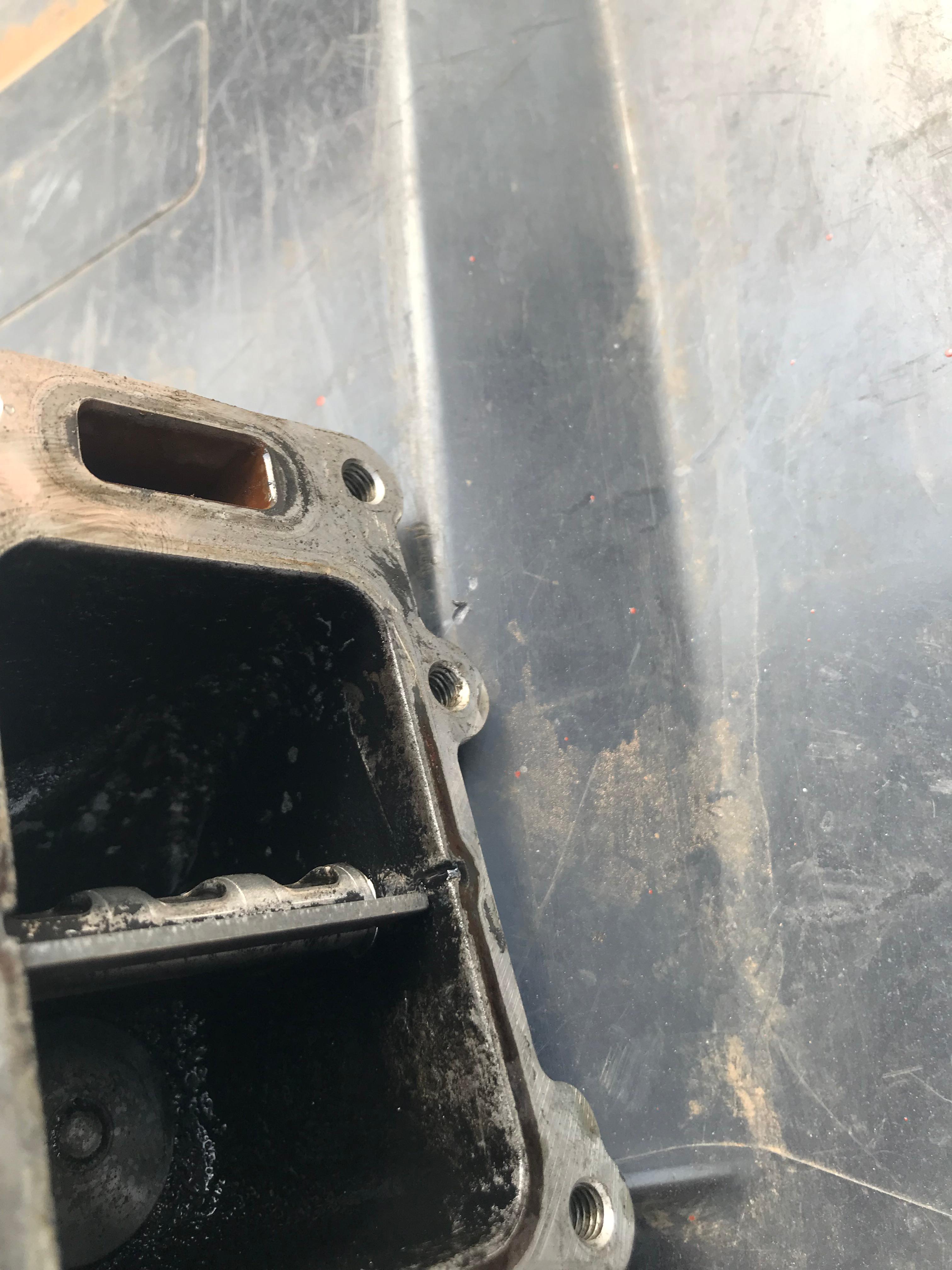 Oil pan with baffle